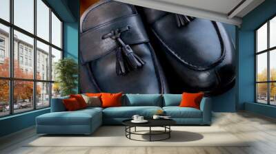 Blue loafer shoes on blue background. One pair. Top view. Wall mural