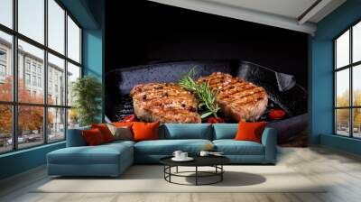 Grilled pork steak in grill pan Wall mural