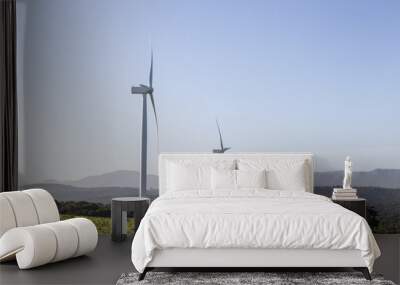 two wind turbines on a hill Wall mural