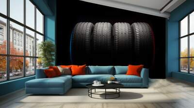 New car tires. Group of road wheels on dark background. Summer Tires with asymmetric tread design. Driving car concept. Wall mural