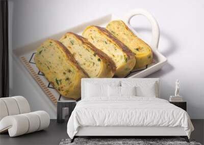 The rolled omelet on the plate Wall mural