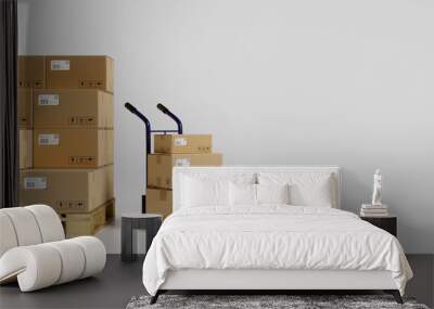 3D rendering, heap of cardboard boxes in the warehouse with a cart in white background Wall mural