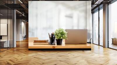 Back view home office workspace laptop and supplies on wooden desk. Wall mural