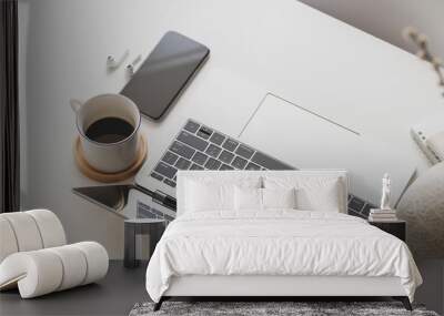 Close-up view of modern workspace with laptop computer and office supplies Wall mural