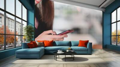 Close up view of professional businesswomen using on smartphone Wall mural