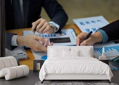 Cropped image of a team of financial management having a meeting Wall mural