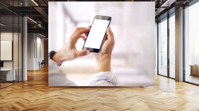 People, Communication and Technology Concept. Close up of man with smartphones at office. Wall mural