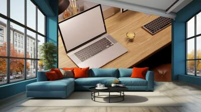 Top view, Cozy Scandinavian home working space with laptop mockup and decor on wood table Wall mural