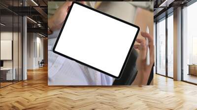 Top view of a man holding mockup blank screen digital tablet device Wall mural