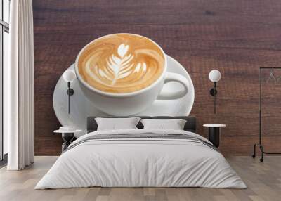 Coffee cup of rosetta latte art on wooden background with copy s Wall mural