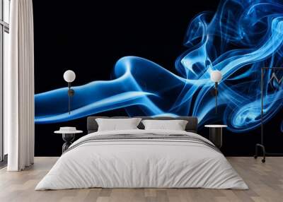 Abstract blue smoke swirls on black background. Wall mural