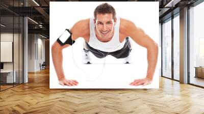 Young sport man doing exercices Wall mural