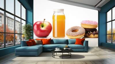 A colorful variety of delicious food items including fresh fruit, juice, and tasty donuts on a clean white background. Wall mural