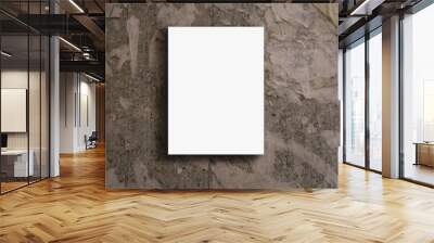 Empty vertically fixed on shabby concrete wall white poster with mockup space Wall mural