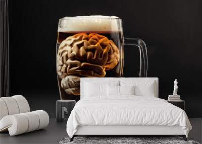 Glass of dark beer with human brain model inside, illustrating effects of alcohol on brain function, set against black background Wall mural