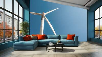 Windmill vane generated solar energy against clear blue sky Wall mural