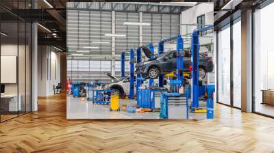 Bangkok Thailand, December 10, 2016: Car in the lifting equipment in the garage being repair and fix at Bangkok,Thailand Wall mural