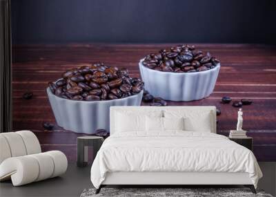 roasted coffee beans in two white bowl porcelain on wooden backg Wall mural