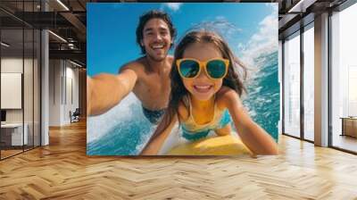 Happy father and daughter enjoying a fun surfing adventure in the ocean on a sunny day, radiating joy and excitement. Wall mural