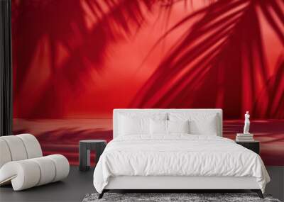 Vibrant red background with tropical palm leaf shadows, creating a warm and exotic ambiance perfect for summer-themed designs. Wall mural