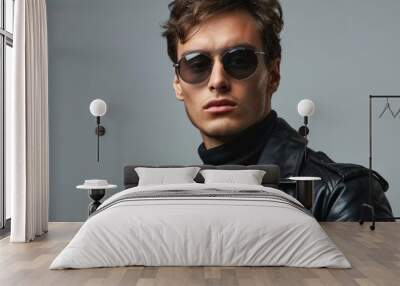 Man in black leather jacket and sunglasses Wall mural