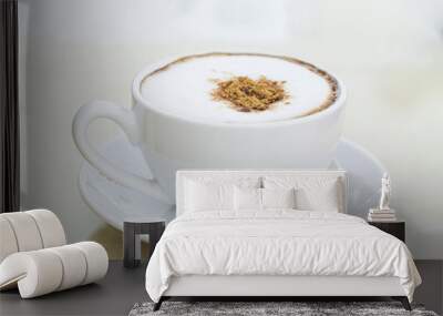 A  hot coffee in cup. Wall mural