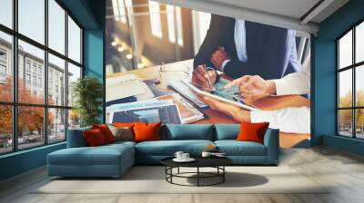 Two businessmen are consulting and planning business operations. Wall mural