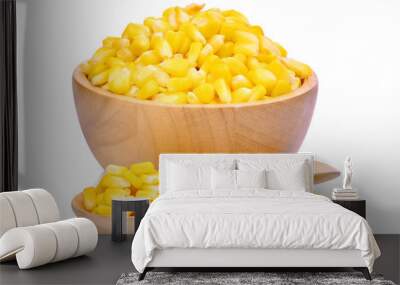 sweet corn in wooden bowl and spoon isolated on white background Wall mural