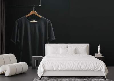 A black shirt hanging on a clothes hanger Wall mural