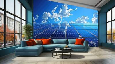 A solar panels and clear blue sky with a few clouds and the sun shining brightly. Wall mural