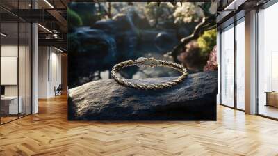 Elegant Golden Bracelet in Serene Nature Setting Wall mural