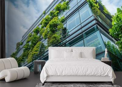 A modern building with vertical gardens and glass facades, promoting sustainability. Wall mural