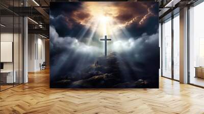 holy cross symbolizing the death and resurrection of Jesus Christ with The sky over the Hill is shrouded in light and clouds Wall mural