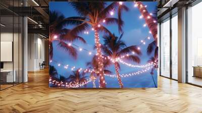 Palm trees decorated with Christmas garland night, fairy lights. lighted coconut by led light bulbs those bind led around the trunk with blue sky on the background Wall mural