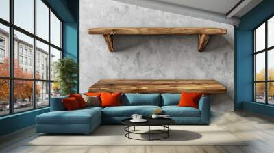 Two wooden shelves mounted on a concrete wall, showcasing a minimalist design. Wall mural