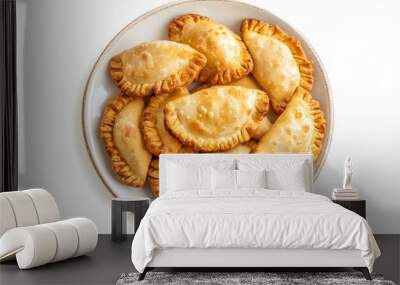 Golden empanadas on white plate - delicious homemade pastry treat Wall mural