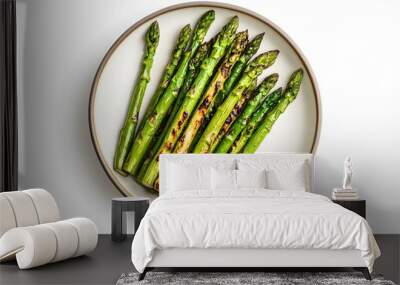 Grilled asparagus spears on a round plate - fresh and healthy gourmet presentation Wall mural