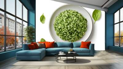 Healthy spinach rice dish on white plate with fresh green leaves - ideal for clean eating inspiration Wall mural