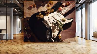 Romantic still life with an electric guitar, dried flowers and rare sheet music close up. Wall mural