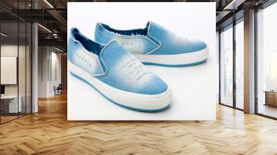 casual denim shoes isolated on a white background, denim sneakers close-up Wall mural