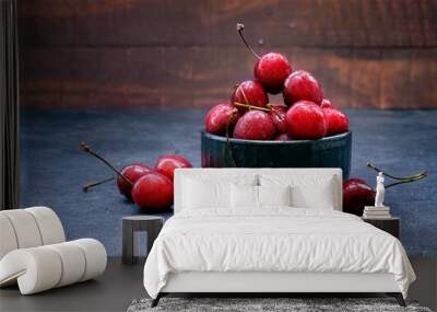 ripe cherries on a dark wooden background Wall mural