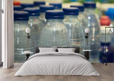 small bottles of water on the shelf Wall mural