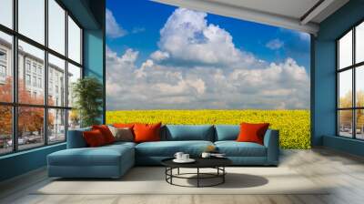 Clouds over a yellow field Wall mural