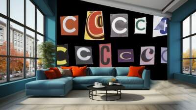 Set of cut-out letter “C” from magazines on a black background, retro y2k style Wall mural