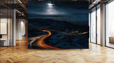 The winding mountain High Alpine Road Pass at night with light tracks from cars, Grossglockner Hochalpenstrasse, Austria Wall mural