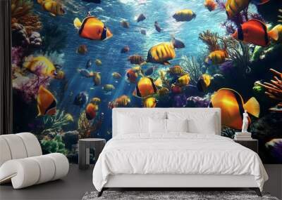 Captivating underwater seascape showcasing a diverse school of colorful tropical fish swimming in the serene blue ocean waters Wall mural