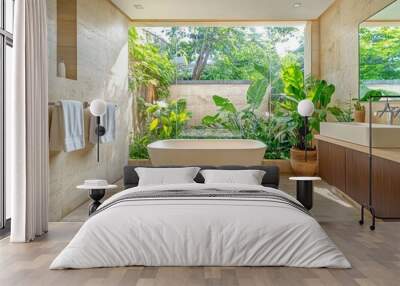 A bathroom with a white bathtub and a mirror. There are two towels hanging on the wall Wall mural