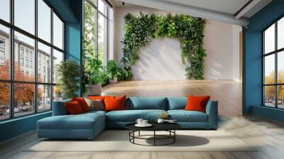 A room with a large plant wall and a window Wall mural