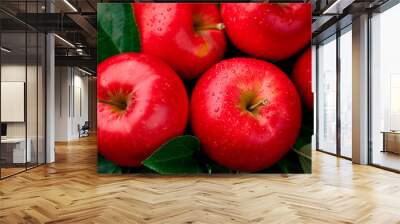 Closeup of fresh red apples with water droplets shot against a plain background, concept of healthy eating and freshness Wall mural