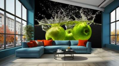 Group of green apples falling in water on black background Wall mural